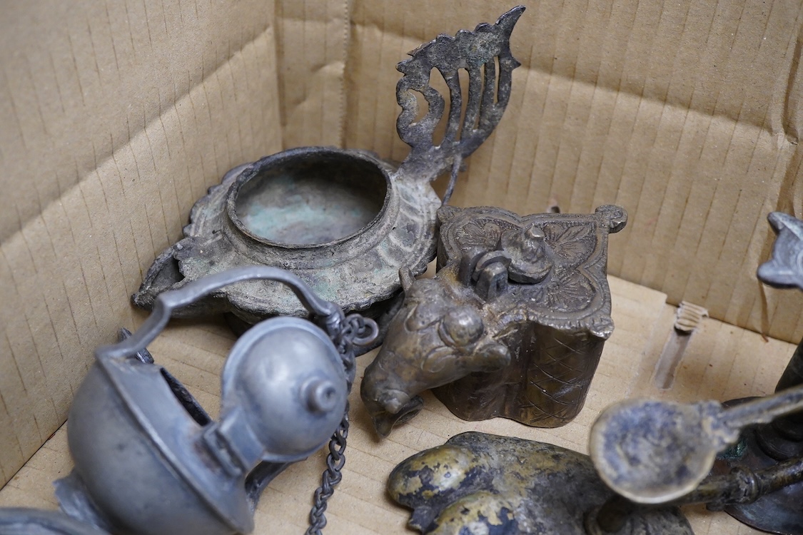 A group of small Middle Eastern mixed metalware lamps, burners etc